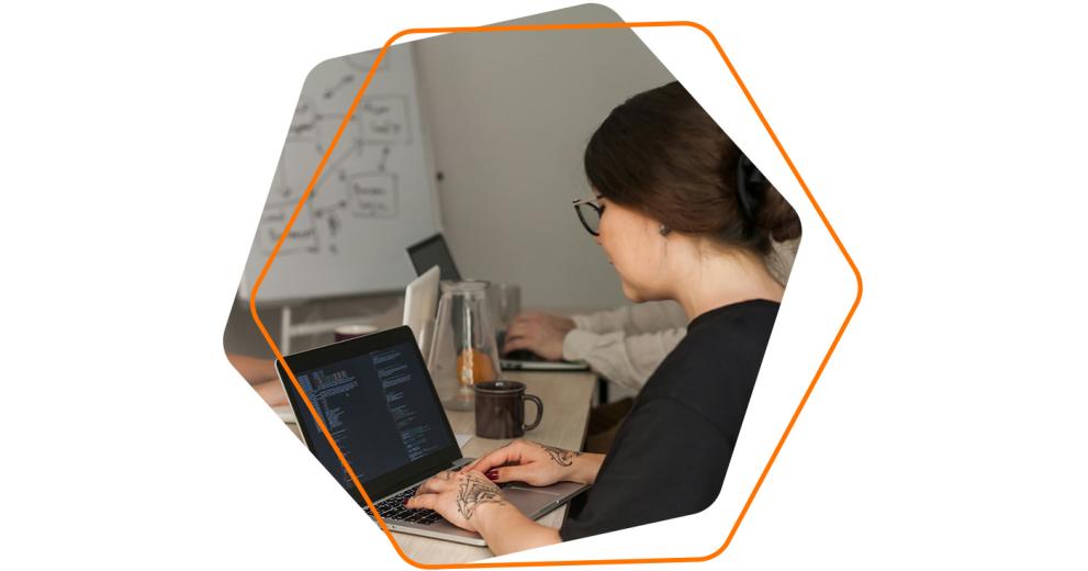 Image of a woman working on her laptop